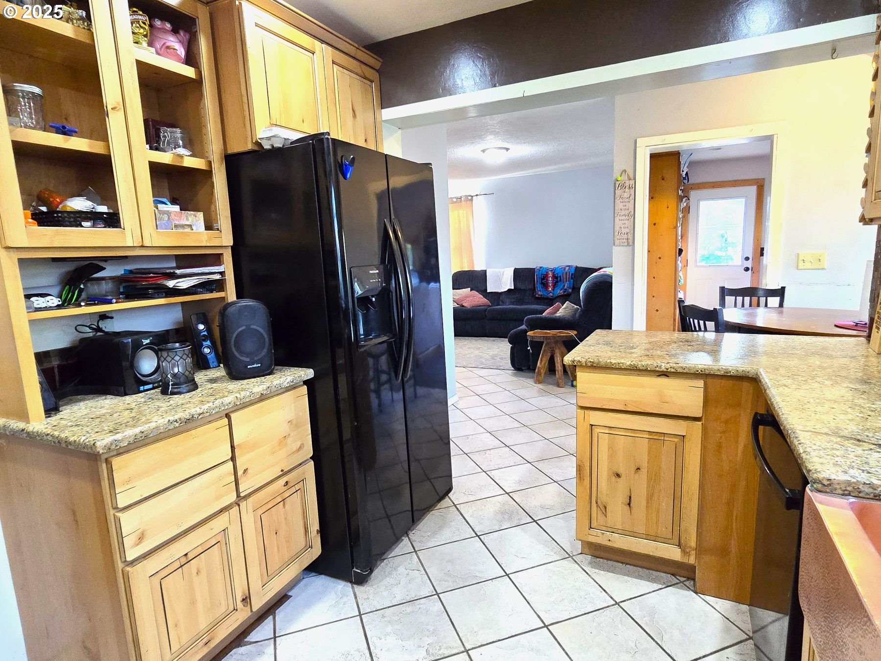 100 Southeast Hillcrest Road John Day, OR 97845 - Photo 5 of 30 a kitchen with stainless steel appliances granite countertop a refrigerator and a stove