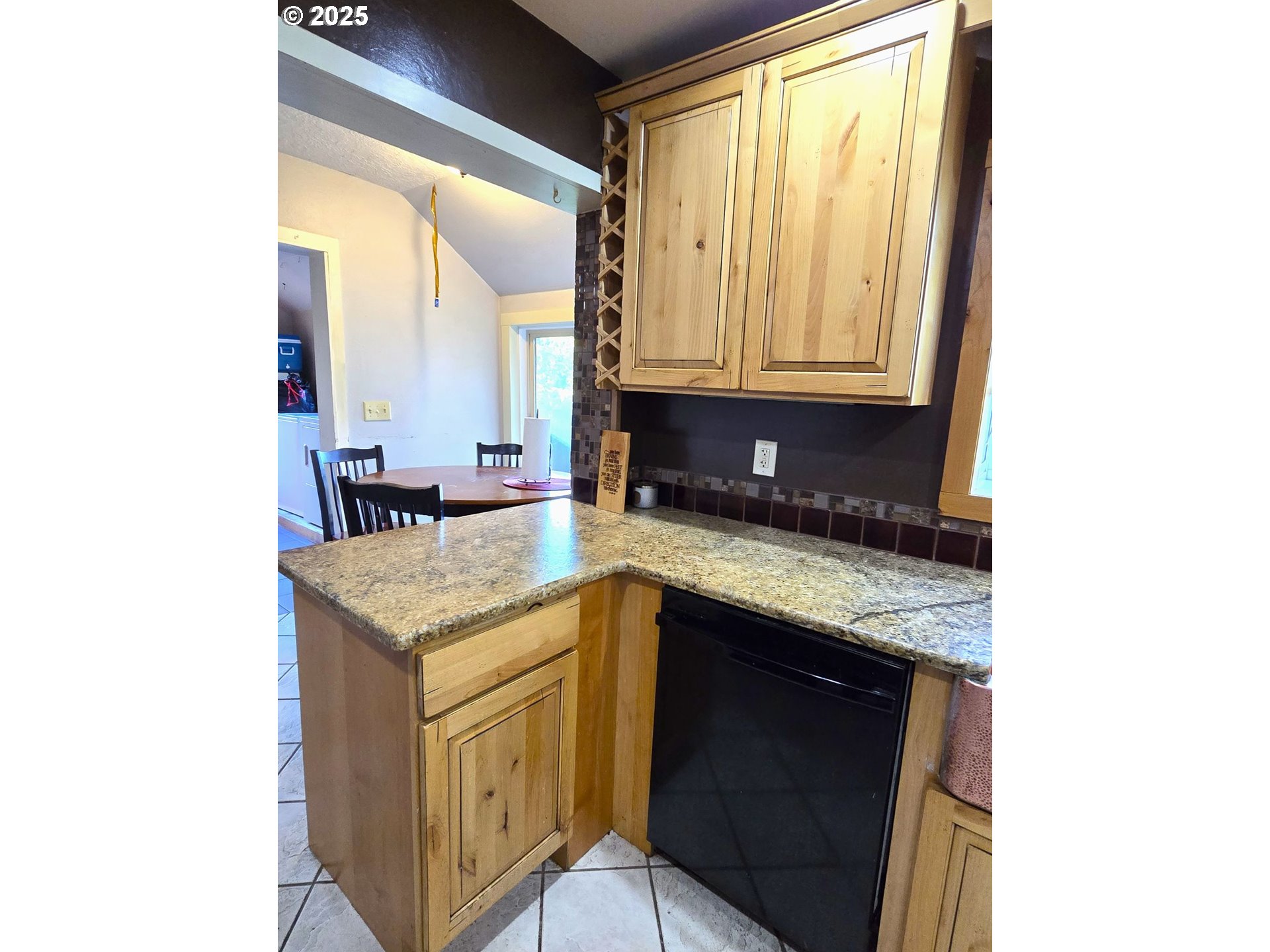 100 Southeast Hillcrest Road John Day, OR 97845 - Photo 8 of 30 a kitchen with a sink stove and cabinets