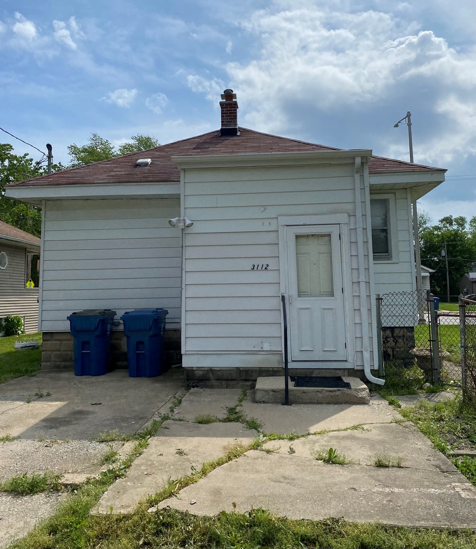 3112 Chicago Road Steger, IL 60475 - Photo 2 of 15 a front view of a house