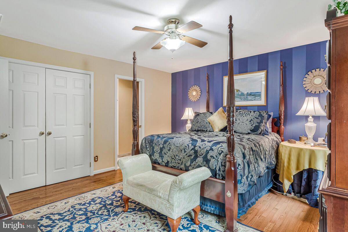 3897 Hunting Creek Road Huntingtown, MD 20639 - Photo 29 of 75 a living room with furniture and wooden floor