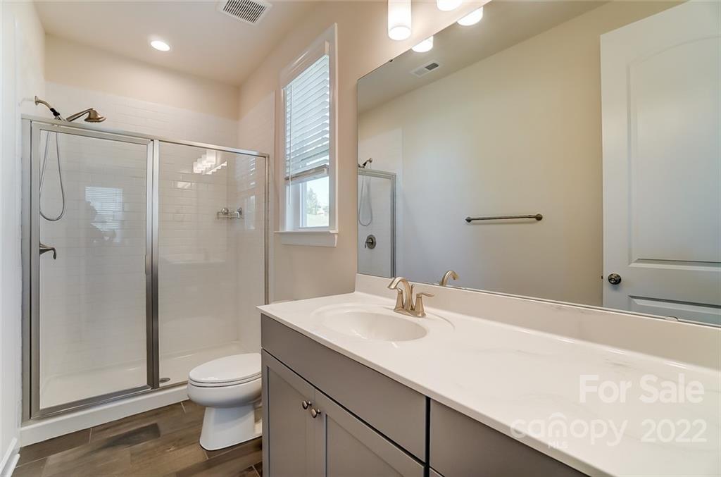 421 Sandbar Point Lake Wylie, SC 29710 - Photo 23 of 48 a bathroom with a sink toilet and shower