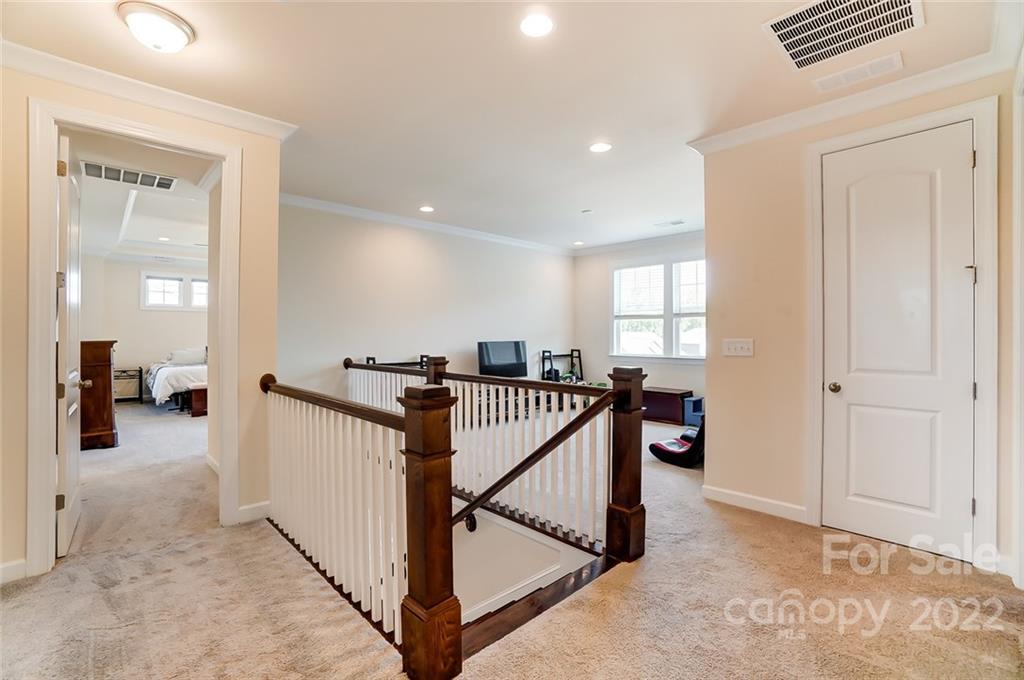 421 Sandbar Point Lake Wylie, SC 29710 - Photo 25 of 48 a view of a livingroom with furniture and staircase