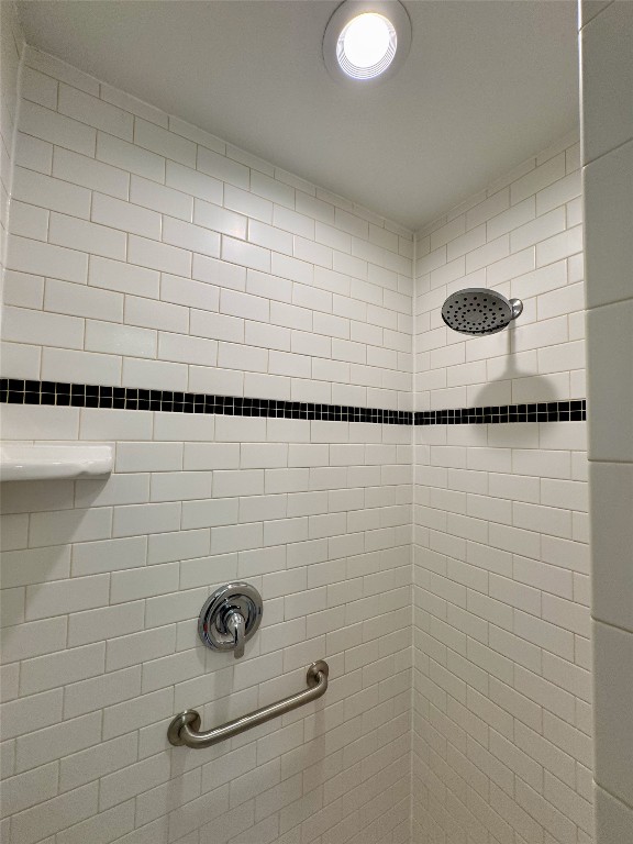 1009 Alegria Road Austin, TX 78757 - Photo 19 of 27 a bathroom with a shower