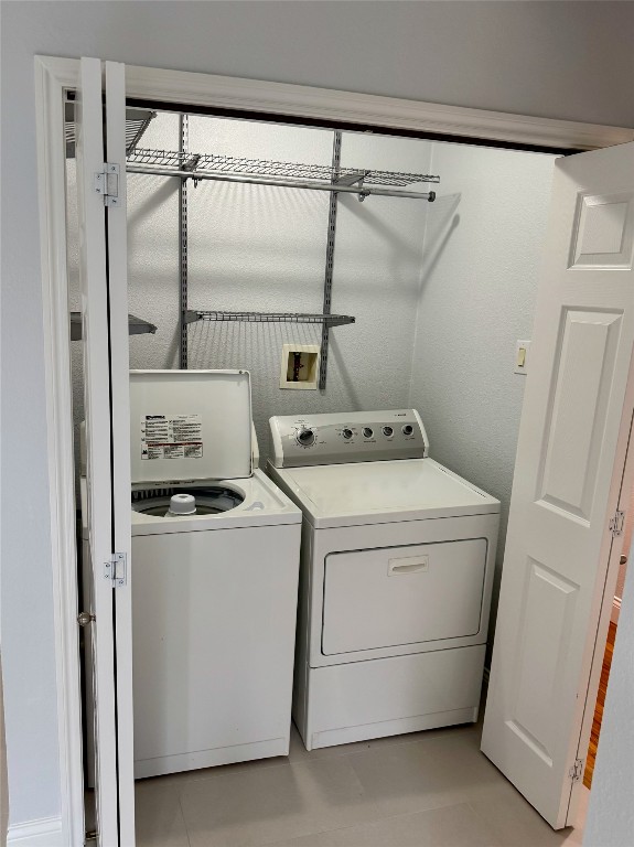 1009 Alegria Road Austin, TX 78757 - Photo 22 of 27 a utility room with dryer and washer