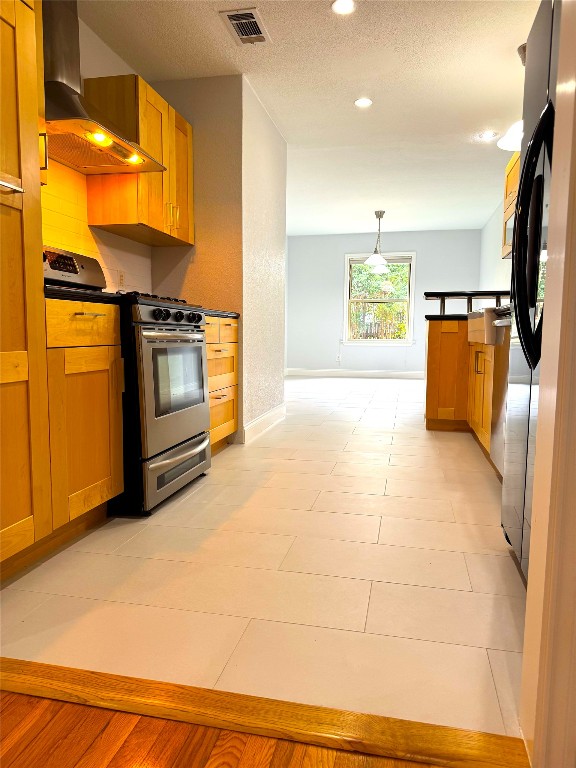 1009 Alegria Road Austin, TX 78757 - Photo 6 of 27 a view of a kitchen with storage and utility
