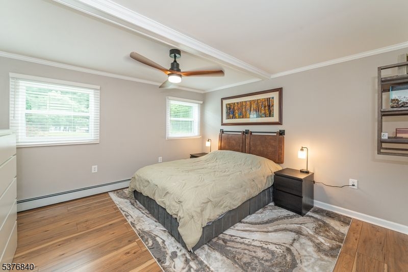 25 East Shore Lake Owassa Road Newton, NJ 07860 - Photo 11 of 19 a bedroom with a large bed and a window