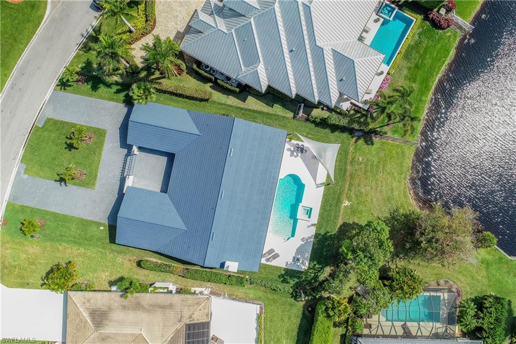 512 Whispering Pine Lane Naples, FL 34103 - Photo 24 of 24 an aerial view of a house