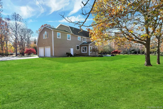 a view of a house with a big yard