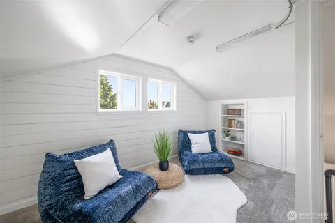 a living room with furniture and window