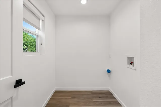 a view of small space with wooden floor