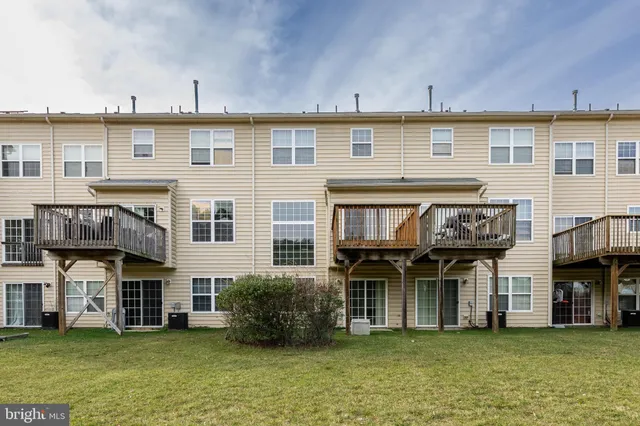 a view of a building with a garden
