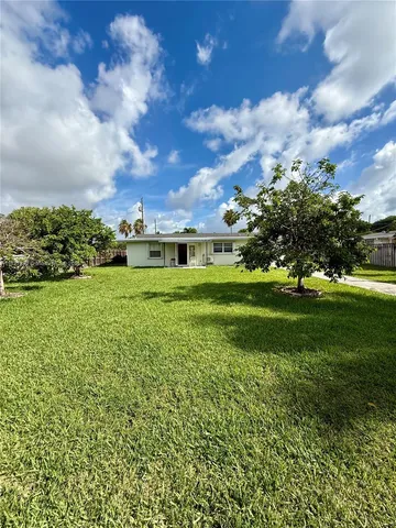 a view of a golf course with a garden