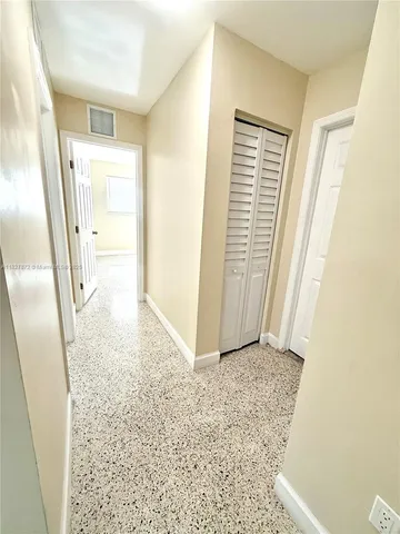 a view of livingroom with wooden floor