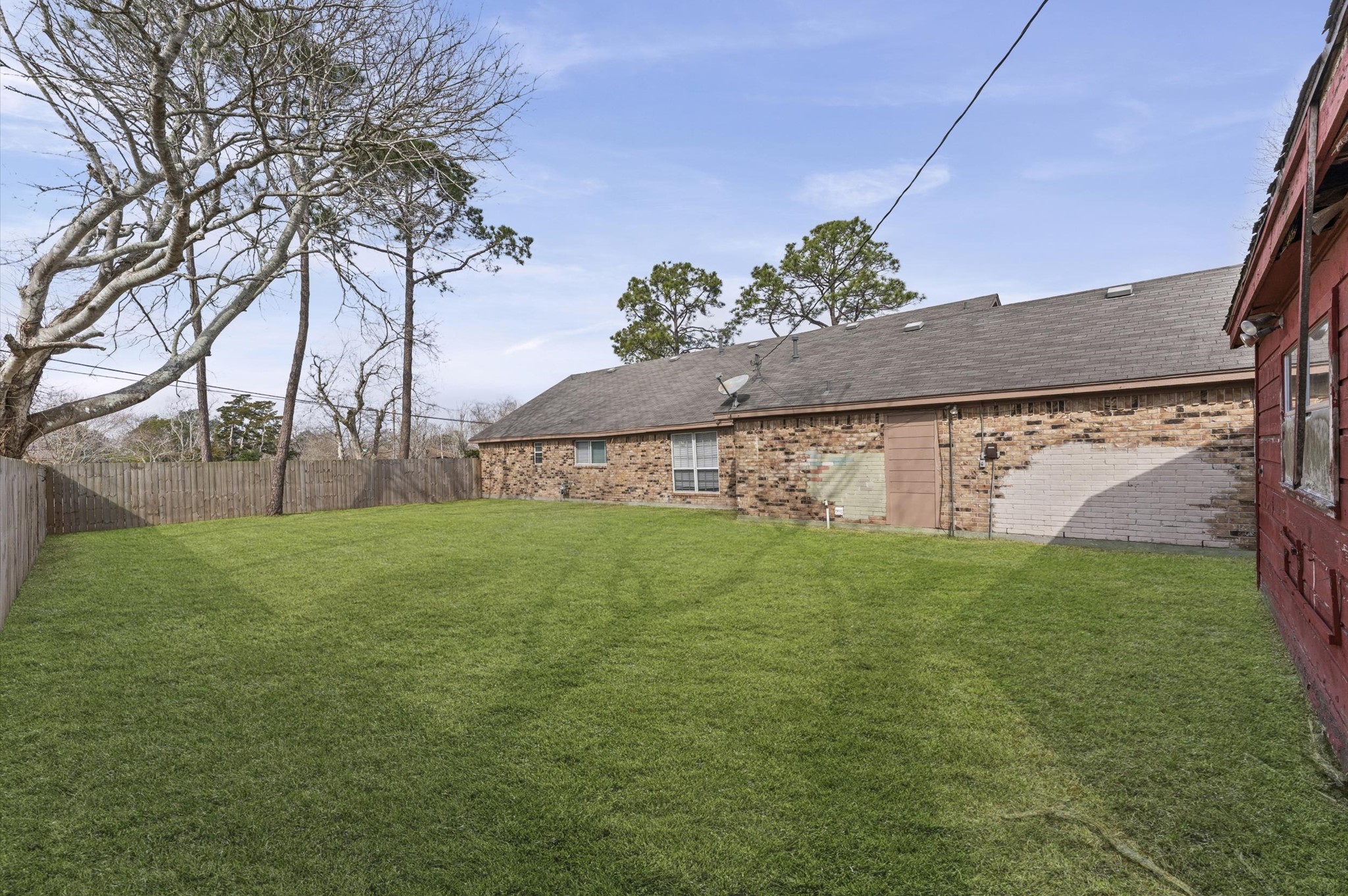 2709 Adams Street Alvin, TX 77511 - Photo 29 of 32 a view of a back yard