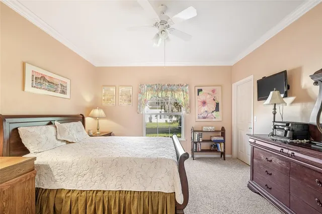 a bedroom with a bed and furniture