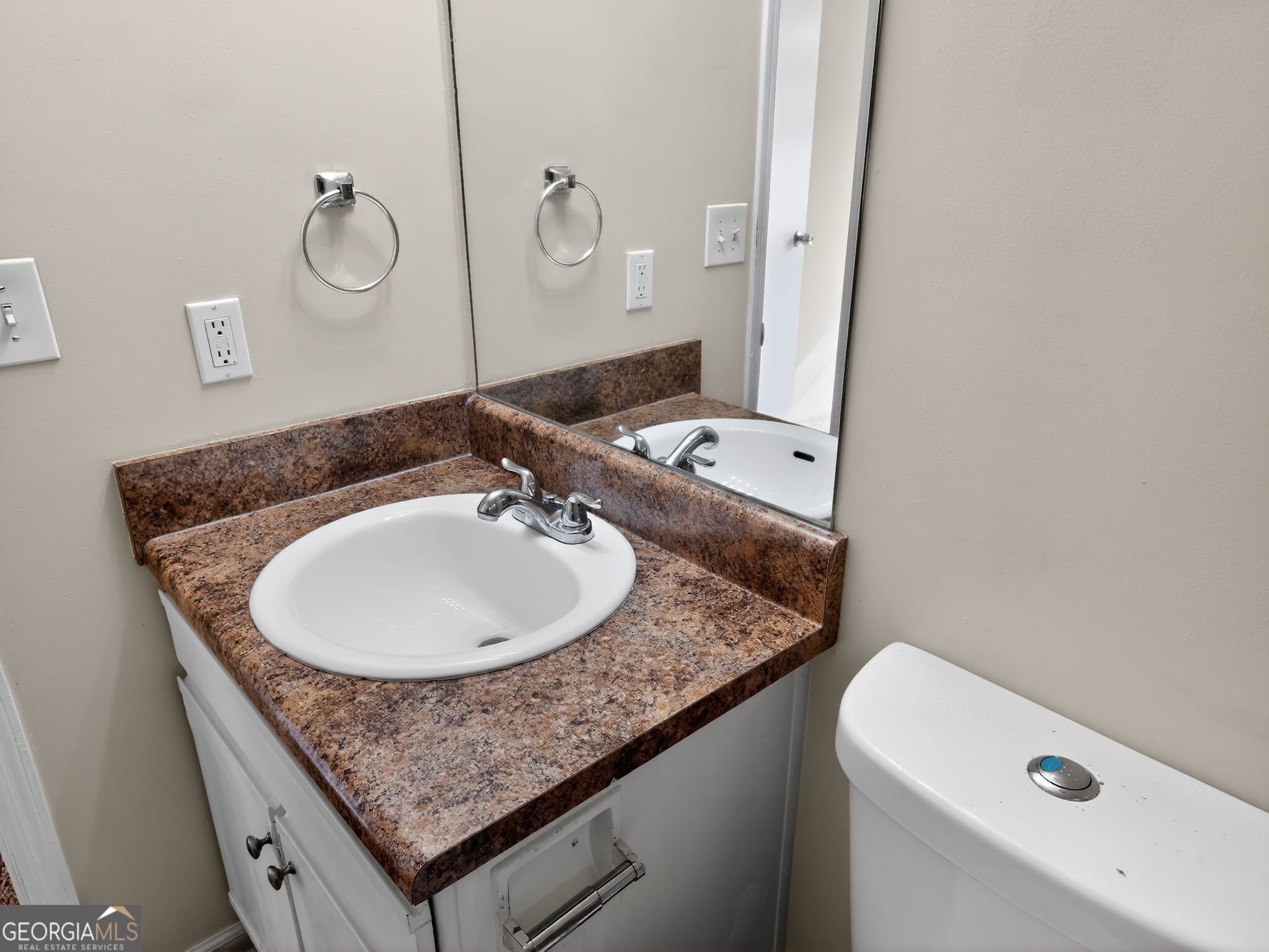 2492 Deep Shoals Circle Decatur, GA 30034 - Photo 24 of 31 a bathroom with a granite countertop sink and a mirror