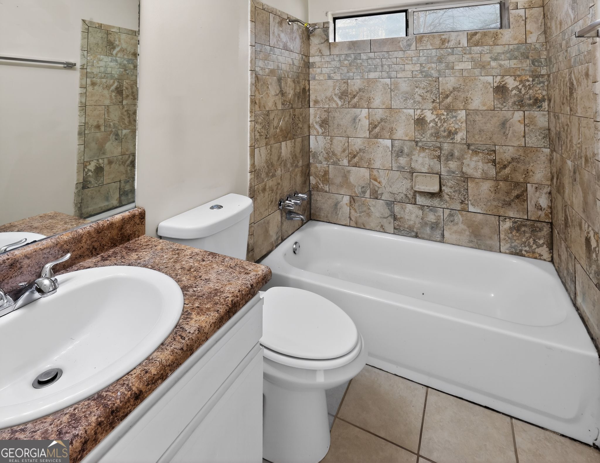 2492 Deep Shoals Circle Decatur, GA 30034 - Photo 26 of 31 a bathroom with a granite countertop sink a toilet and bathtub