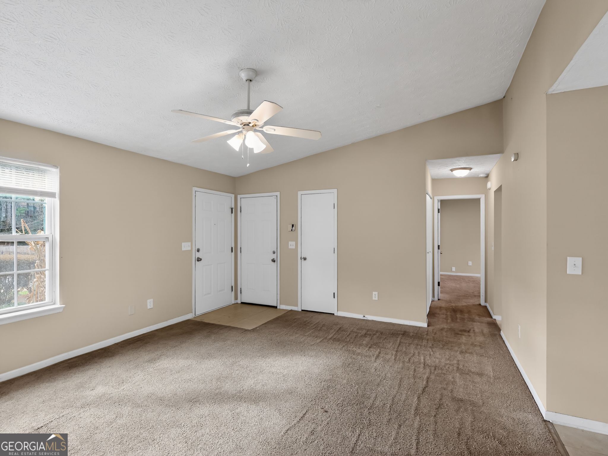 2492 Deep Shoals Circle Decatur, GA 30034 - Photo 3 of 31 a view of an empty room with a window