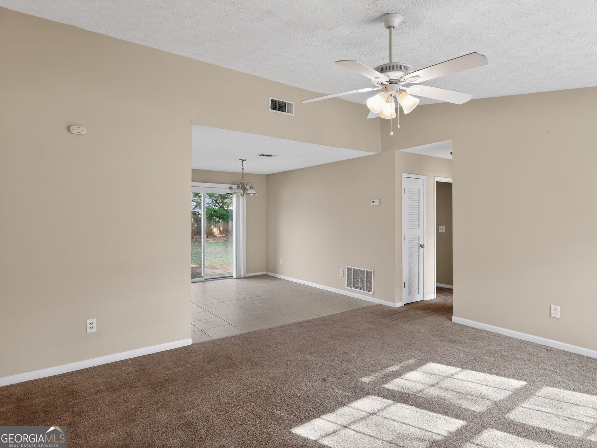2492 Deep Shoals Circle Decatur, GA 30034 - Photo 5 of 31 a view of an empty room with a window