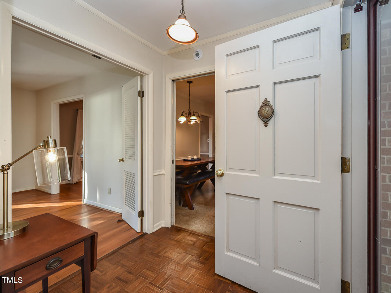 5200 Newhall Road Durham, NC 27713 - Photo 18 of 35 a view of a livingroom with furniture and front door