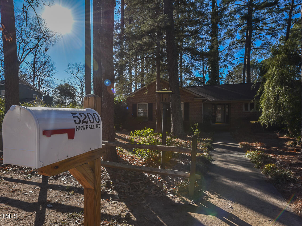 5200 Newhall Road Durham, NC 27713 - Photo 2 of 35 a view of a street with sitting area