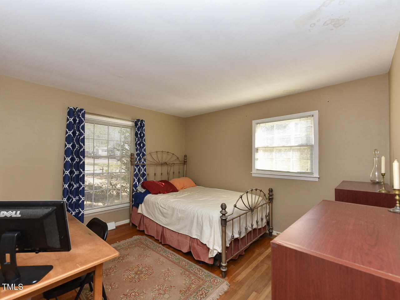 5200 Newhall Road Durham, NC 27713 - Photo 29 of 35 a bedroom with a bed and a window