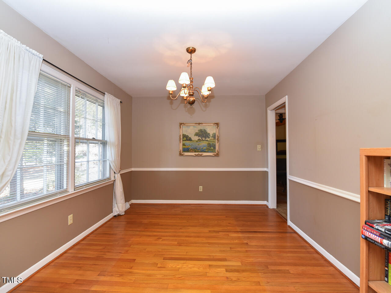 5200 Newhall Road Durham, NC 27713 - Photo 31 of 35 wooden floor in an empty room with a window