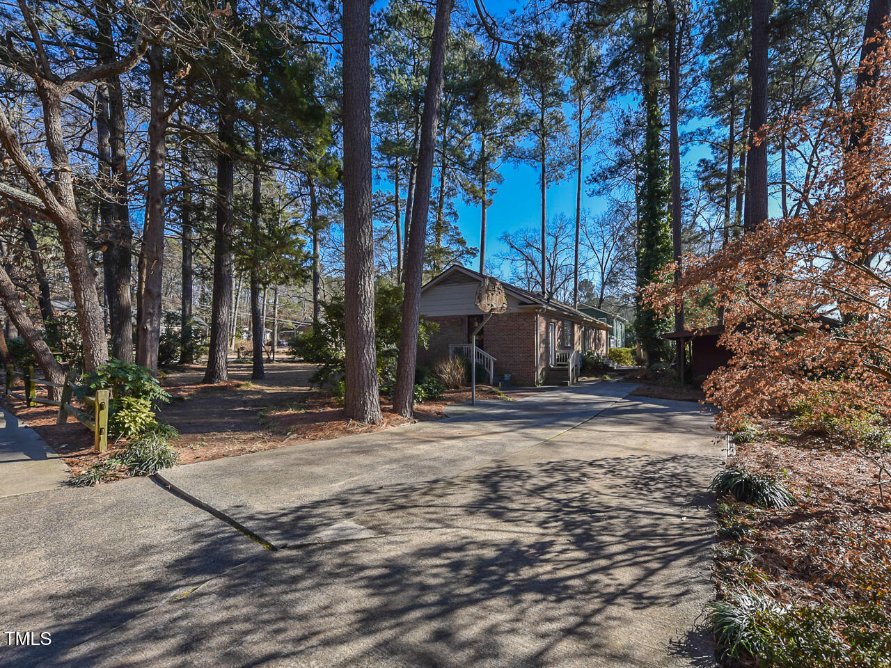 5200 Newhall Road Durham, NC 27713 - Photo 5 of 35 a view of a house with a yard covered in snow