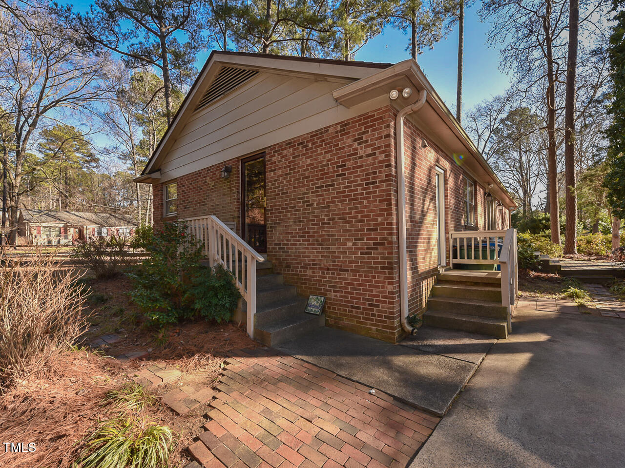 5200 Newhall Road Durham, NC 27713 - Photo 7 of 35 a front view of a house with a yard