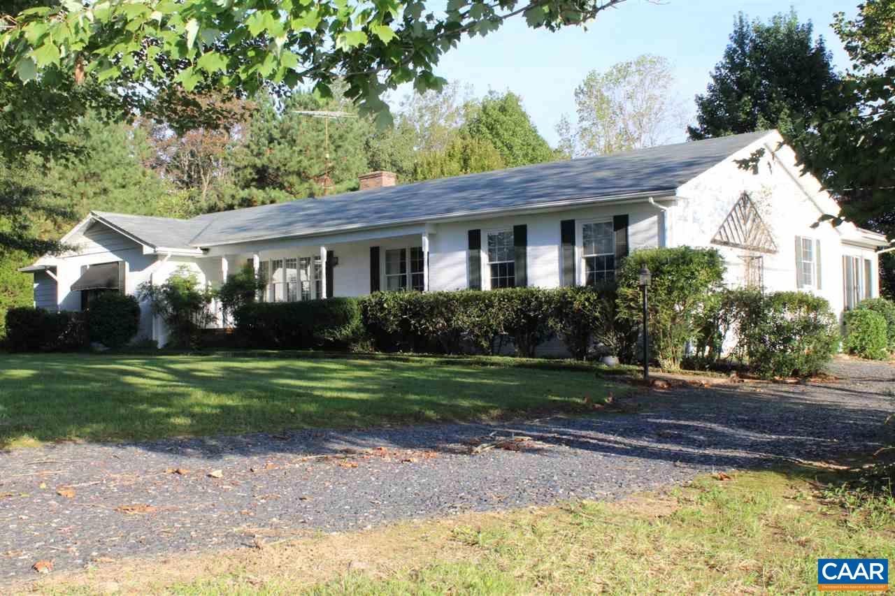 303 Evans Mill Road Dillwyn, VA 23936 - Photo 1 of 14 a front view of a house with a yard