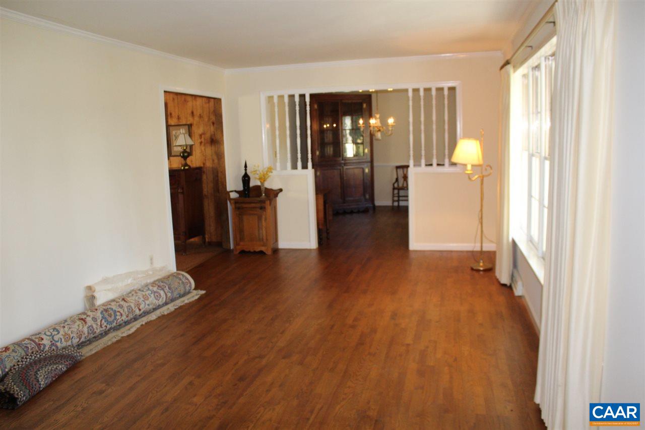 303 Evans Mill Road Dillwyn, VA 23936 - Photo 12 of 14 a view of a room with wooden floor and furniture