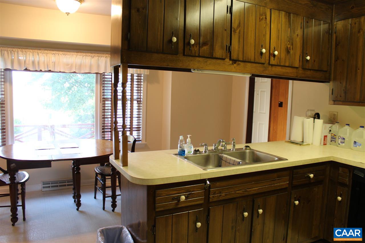 303 Evans Mill Road Dillwyn, VA 23936 - Photo 4 of 14 a bathroom with a sink and a mirror