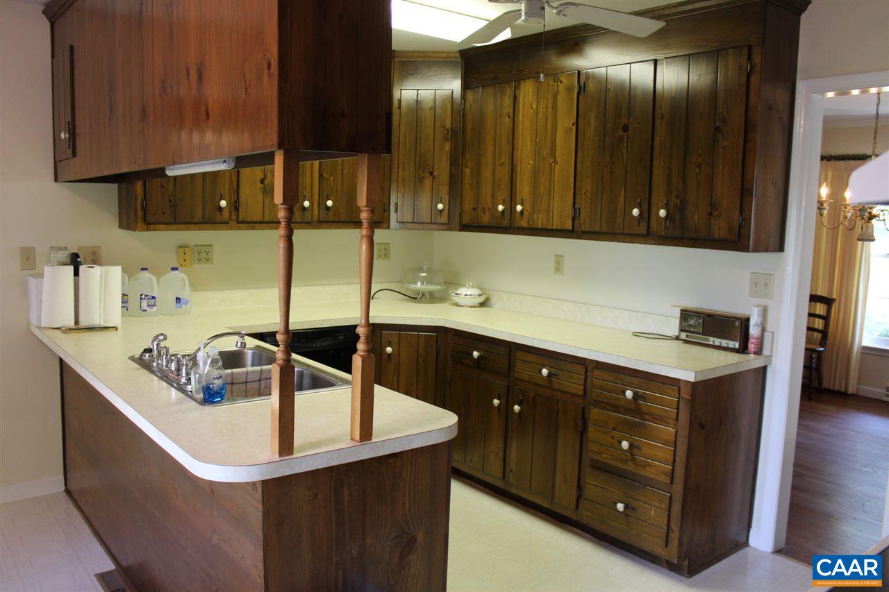 303 Evans Mill Road Dillwyn, VA 23936 - Photo 5 of 14 a kitchen with a sink and cabinets