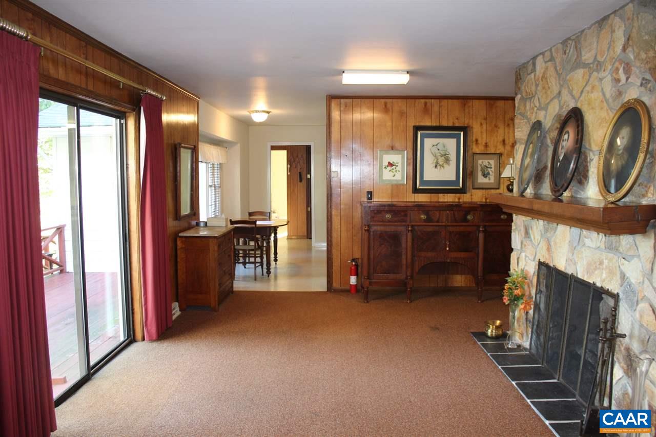 303 Evans Mill Road Dillwyn, VA 23936 - Photo 6 of 14 a view of a livingroom with furniture and a fireplace