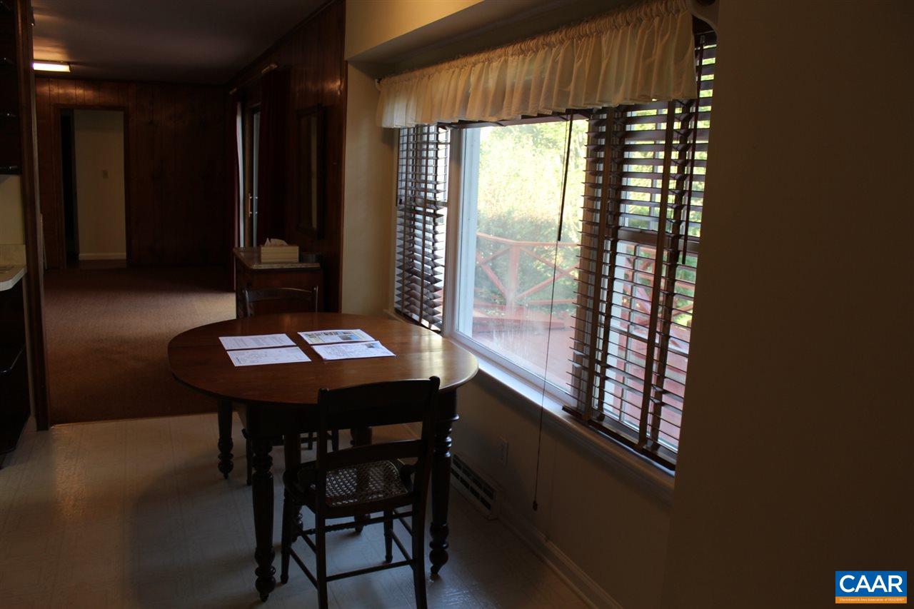 303 Evans Mill Road Dillwyn, VA 23936 - Photo 9 of 14 a view of a dining room with furniture and window