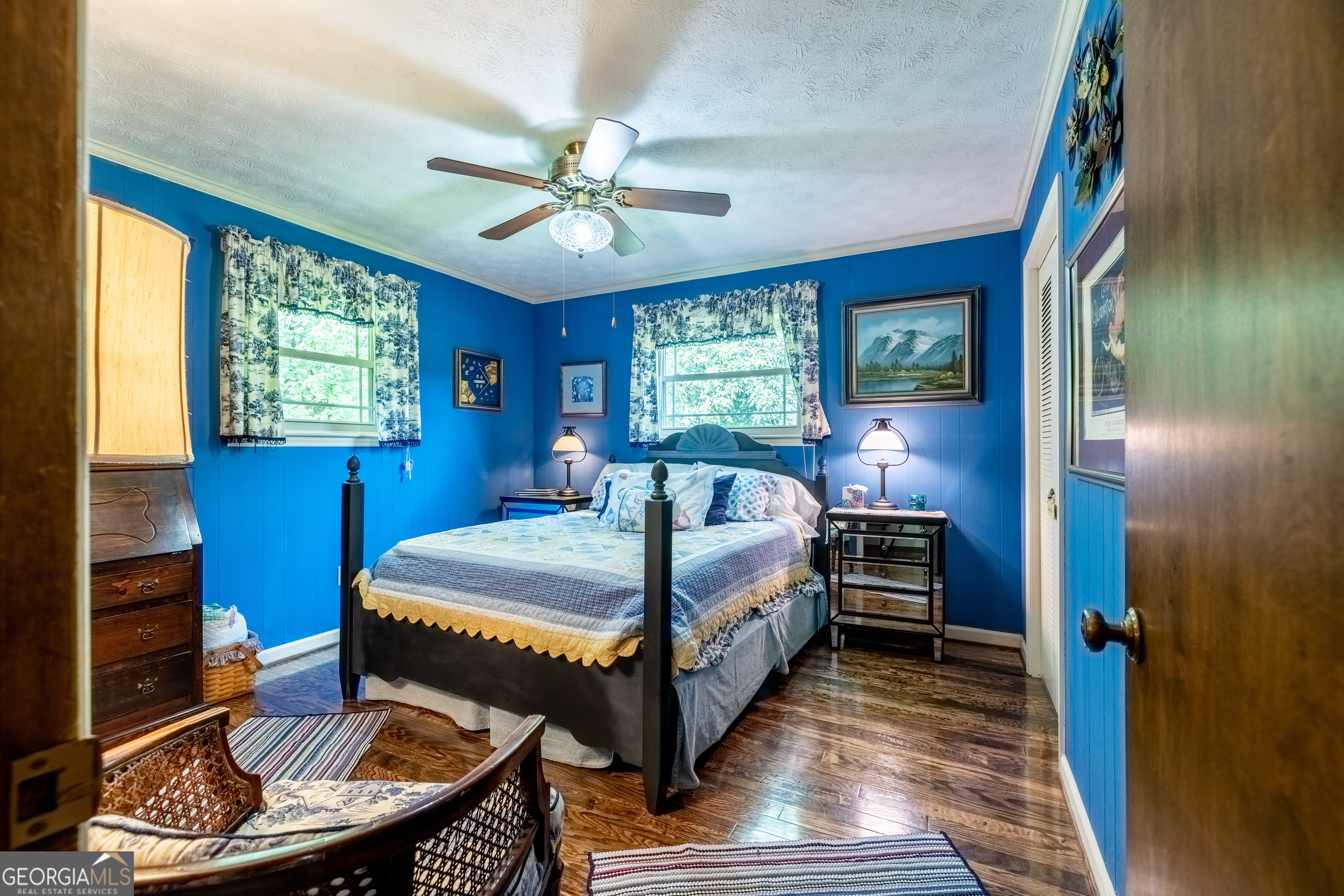 36 Stargazer Trail Northwest Rome, GA 30165 - Photo 16 of 79 a bed room with a bed and a chandelier