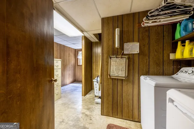a bathroom with a toilet a sink and a shower