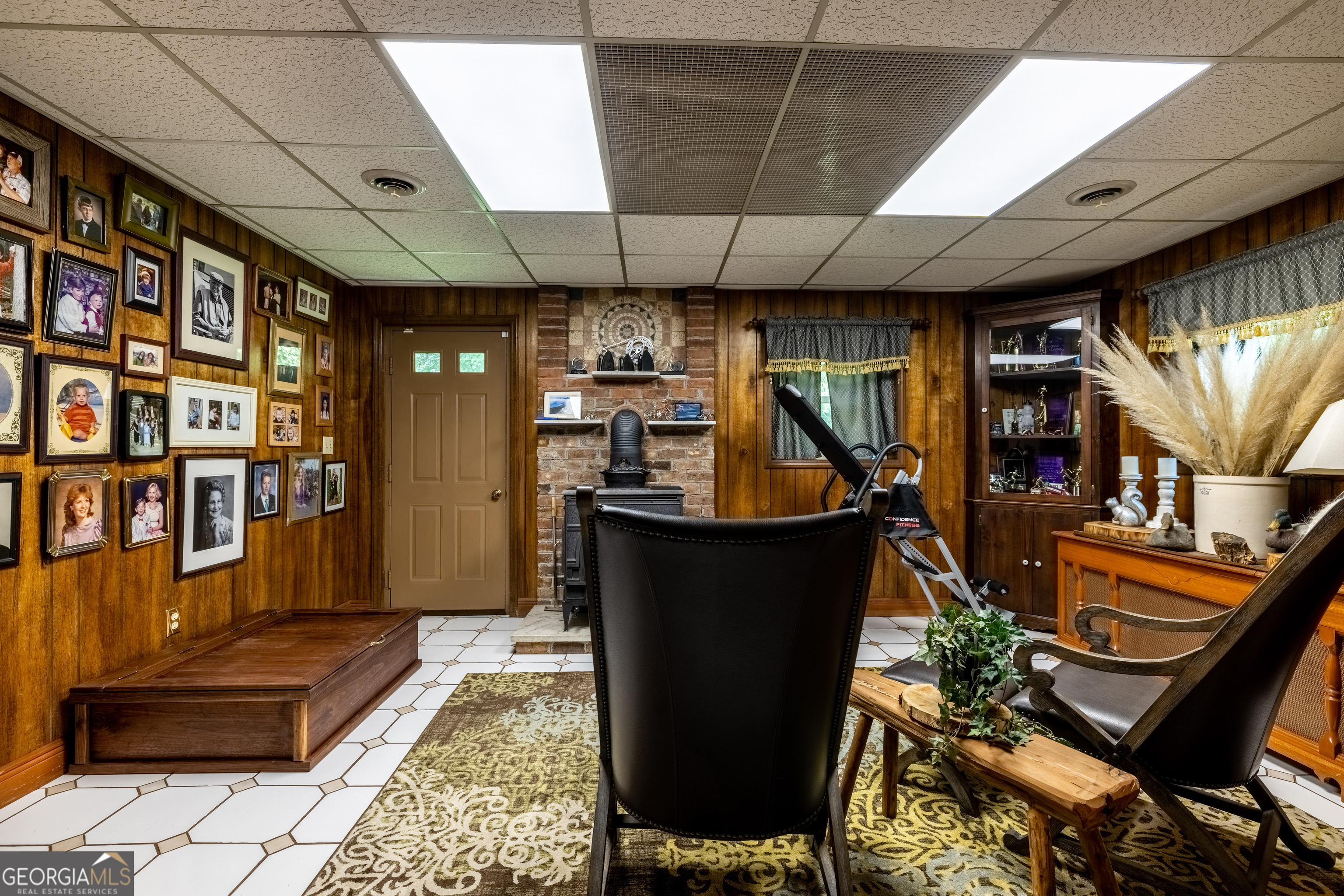 36 Stargazer Trail Northwest Rome, GA 30165 - Photo 22 of 79 a room with lots of wooden furniture and a potted plant