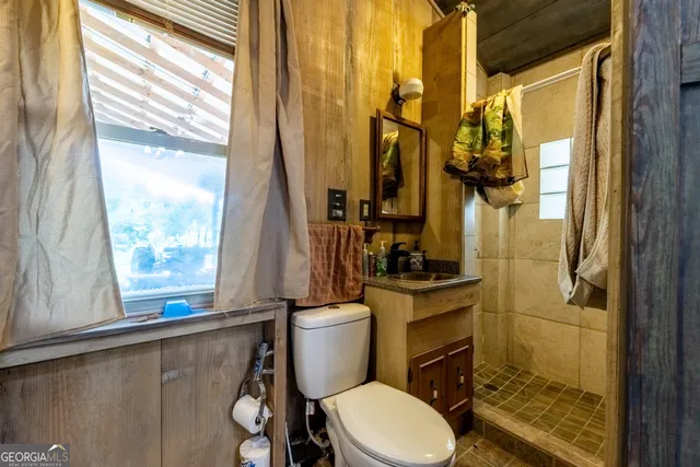 a front view of a house with a yard and porch