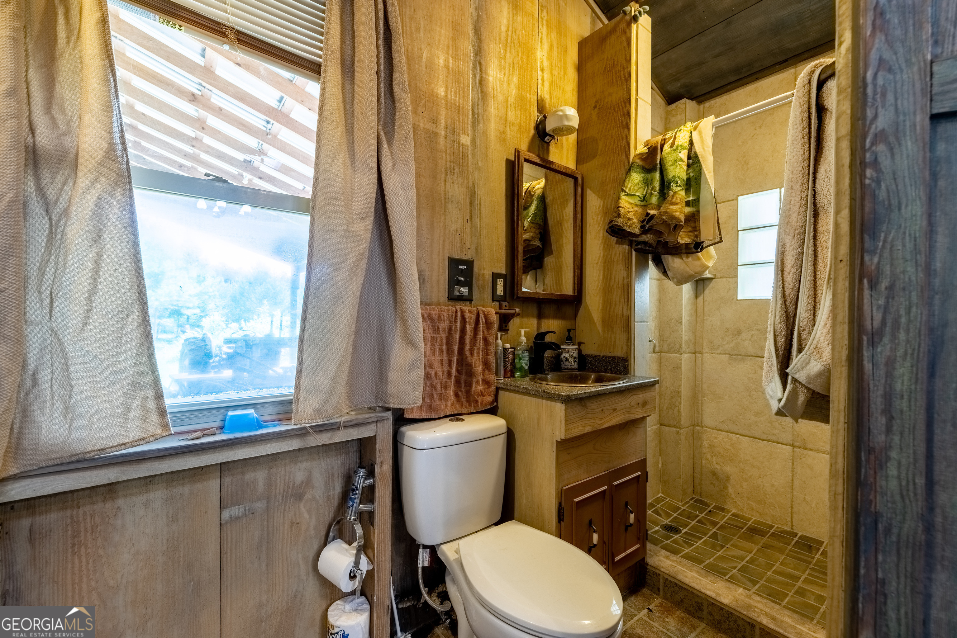 36 Stargazer Trail Northwest Rome, GA 30165 - Photo 28 of 79 a bathroom with a toilet a sink and a shower