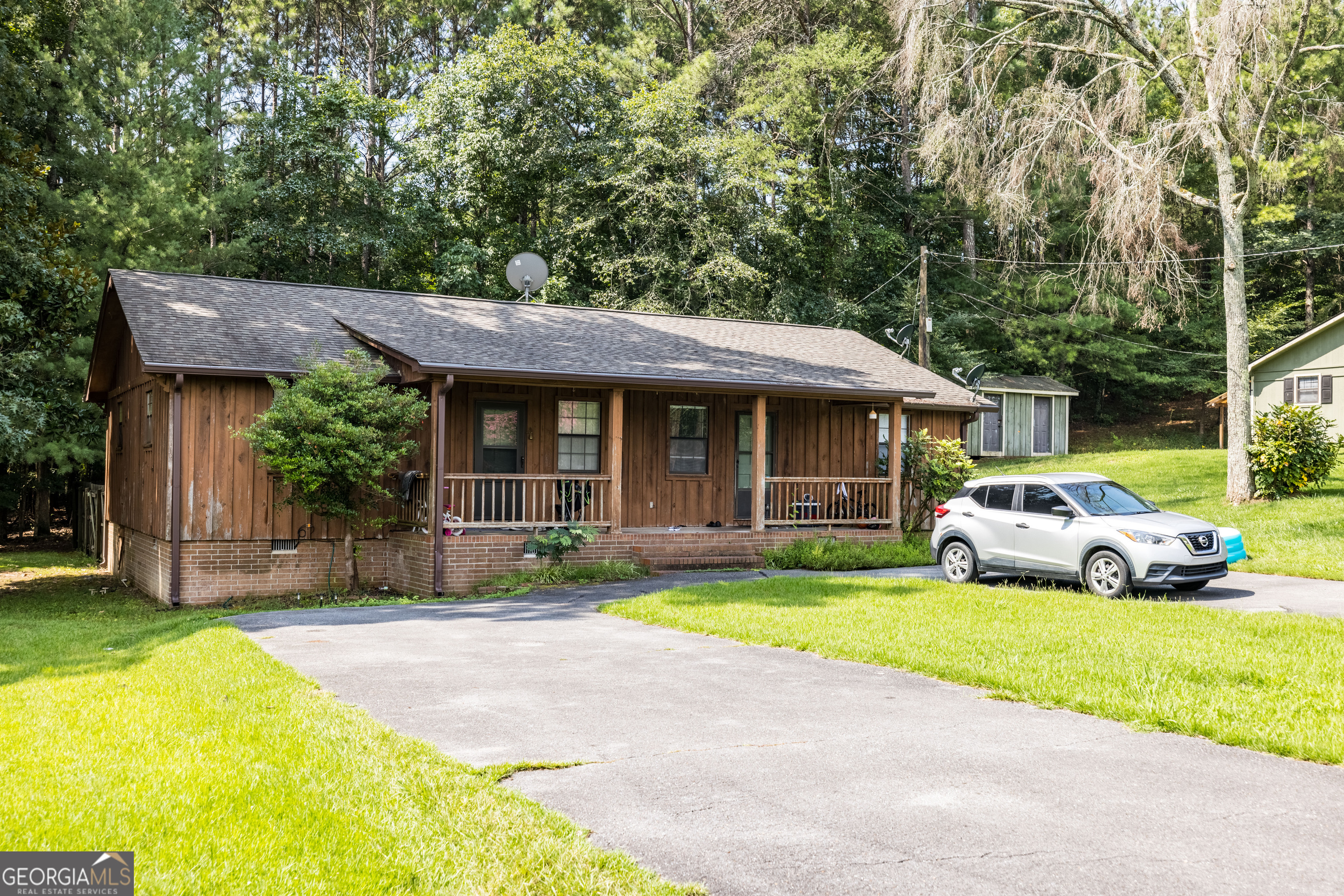 36 Stargazer Trail Northwest Rome, GA 30165 - Photo 38 of 79 a front view of a house with a garden and trees