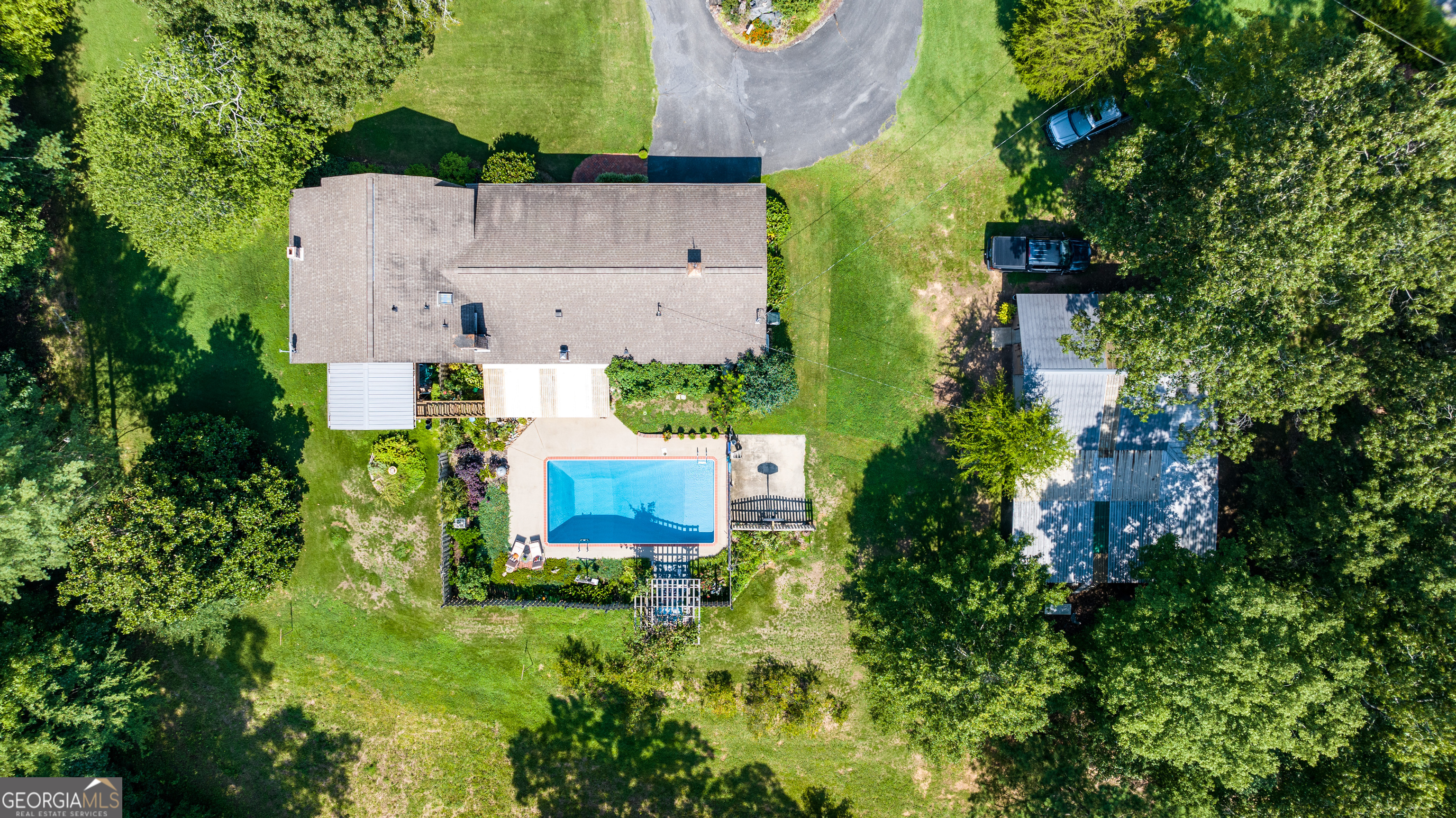 36 Stargazer Trail Northwest Rome, GA 30165 - Photo 56 of 79 an aerial view of a house with a garden and trees