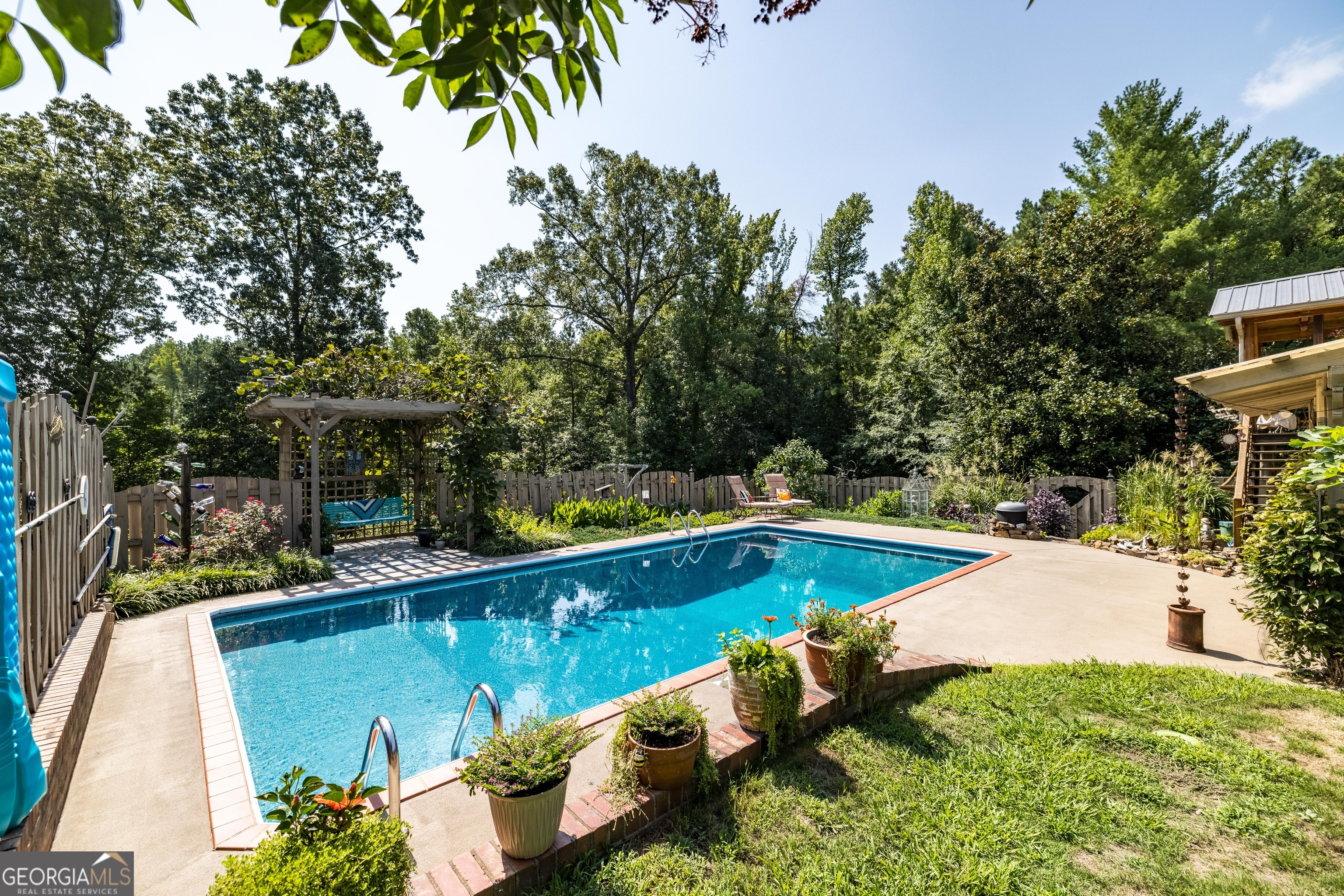 36 Stargazer Trail Northwest Rome, GA 30165 - Photo 79 of 79 a view of a swimming pool with a patio and a yard
