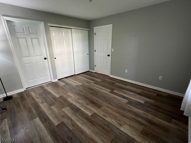 49 Potomac Drive Bernards, NJ 07920 - Photo 7 of 14 a view of empty room with wooden floor