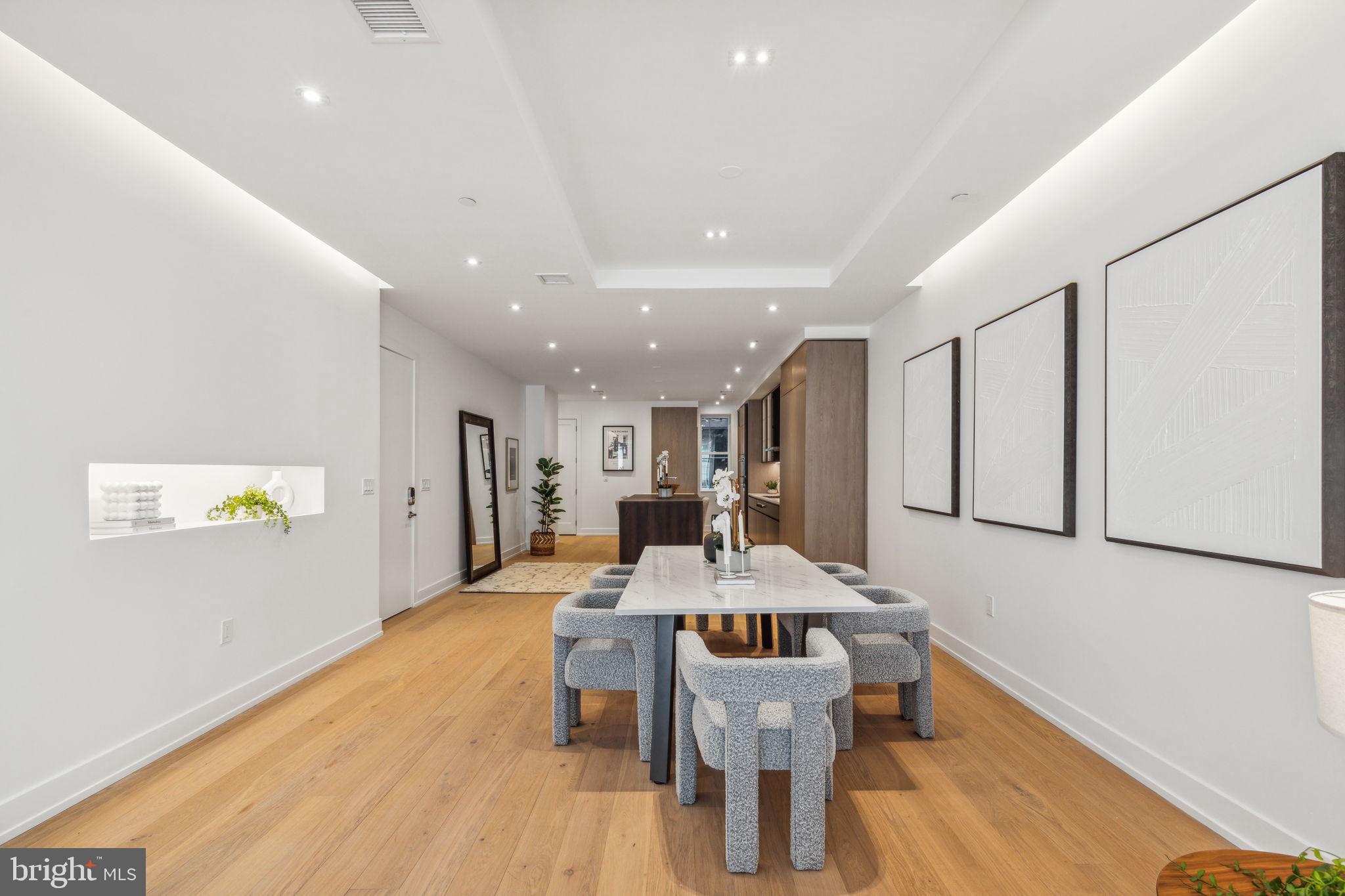 124 North 2nd Street, Unit 4 Philadelphia, PA 19106 - Photo 12 of 48 a view of a dining room with furniture and wooden floor