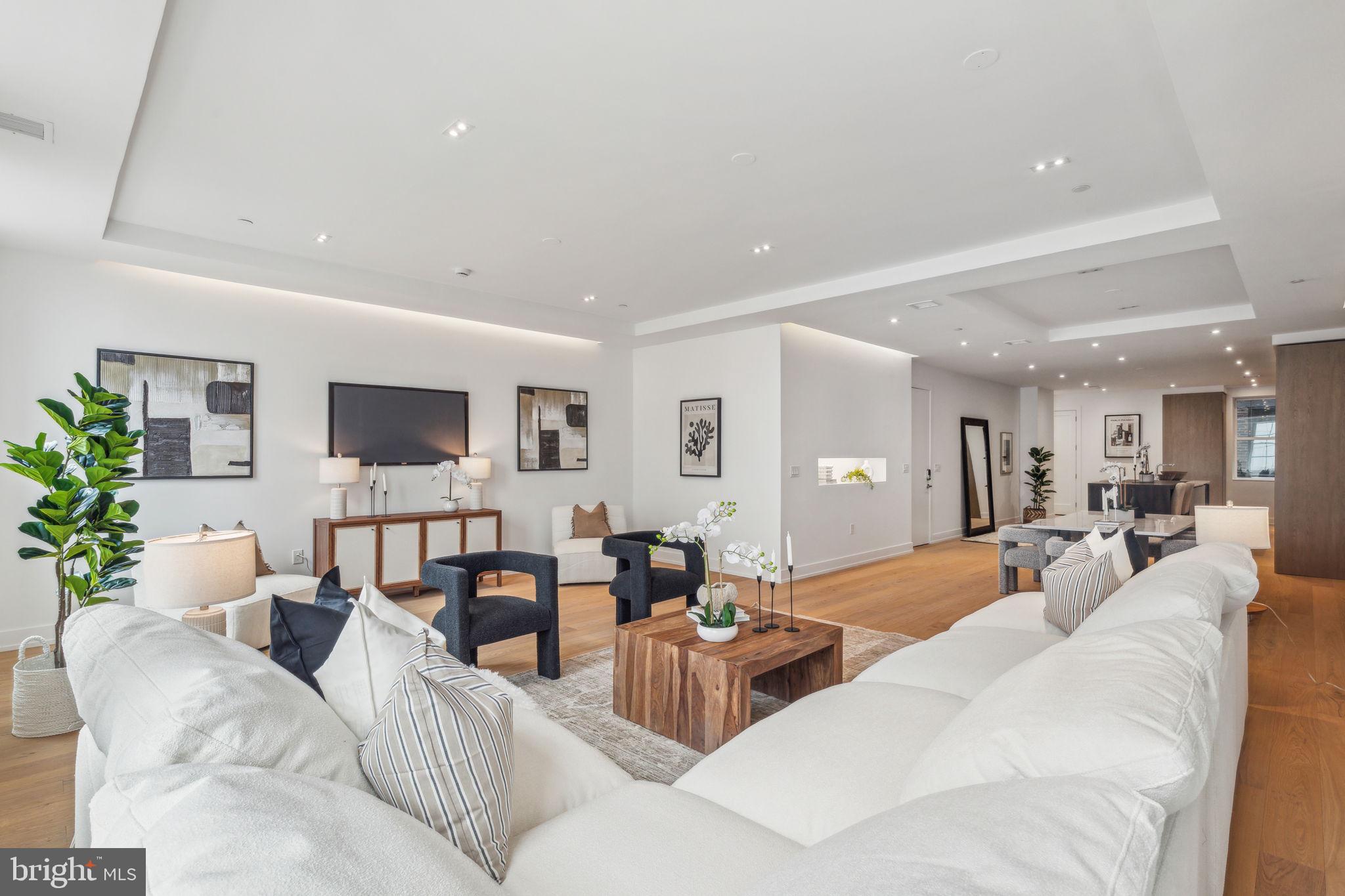 124 North 2nd Street, Unit 4 Philadelphia, PA 19106 - Photo 19 of 48 a living room with furniture and wooden floor