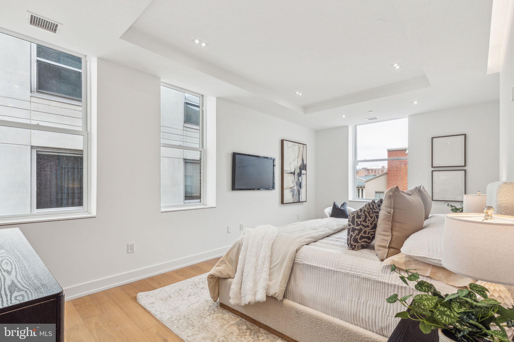 124 North 2nd Street, Unit 4 Philadelphia, PA 19106 - Photo 35 of 48 a living room with furniture and a window