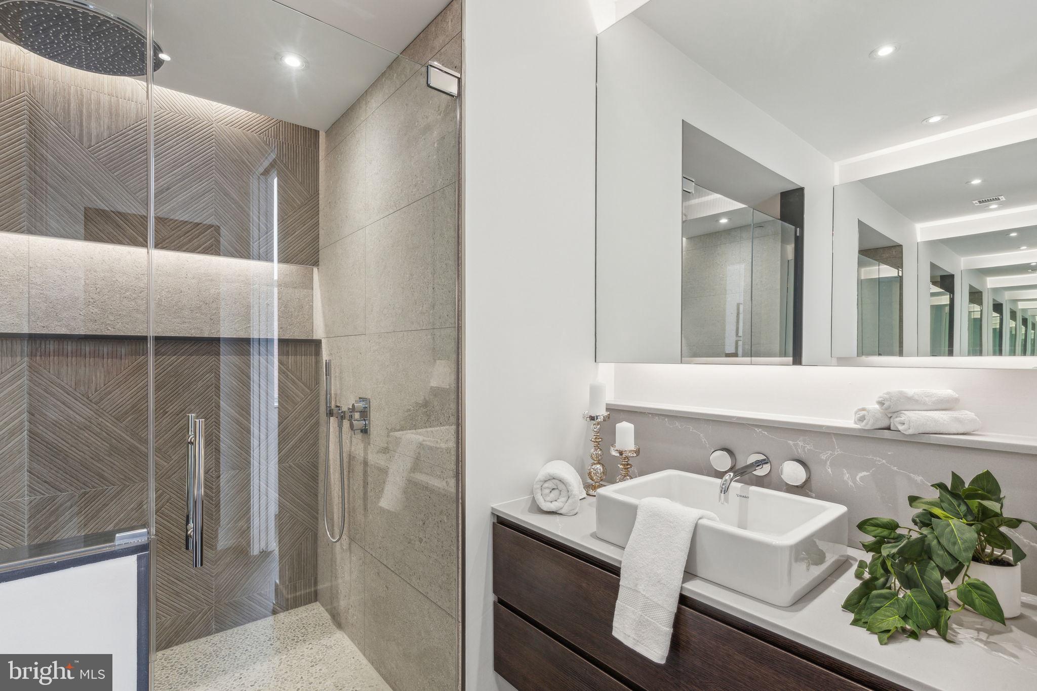 124 North 2nd Street, Unit 4 Philadelphia, PA 19106 - Photo 41 of 48 a bathroom with a sink and a mirror