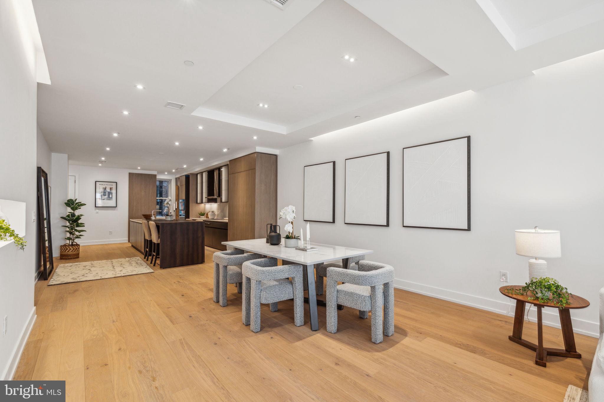 124 North 2nd Street, Unit 4 Philadelphia, PA 19106 - Photo 10 of 48 a living room with furniture a wooden floor and next to a window