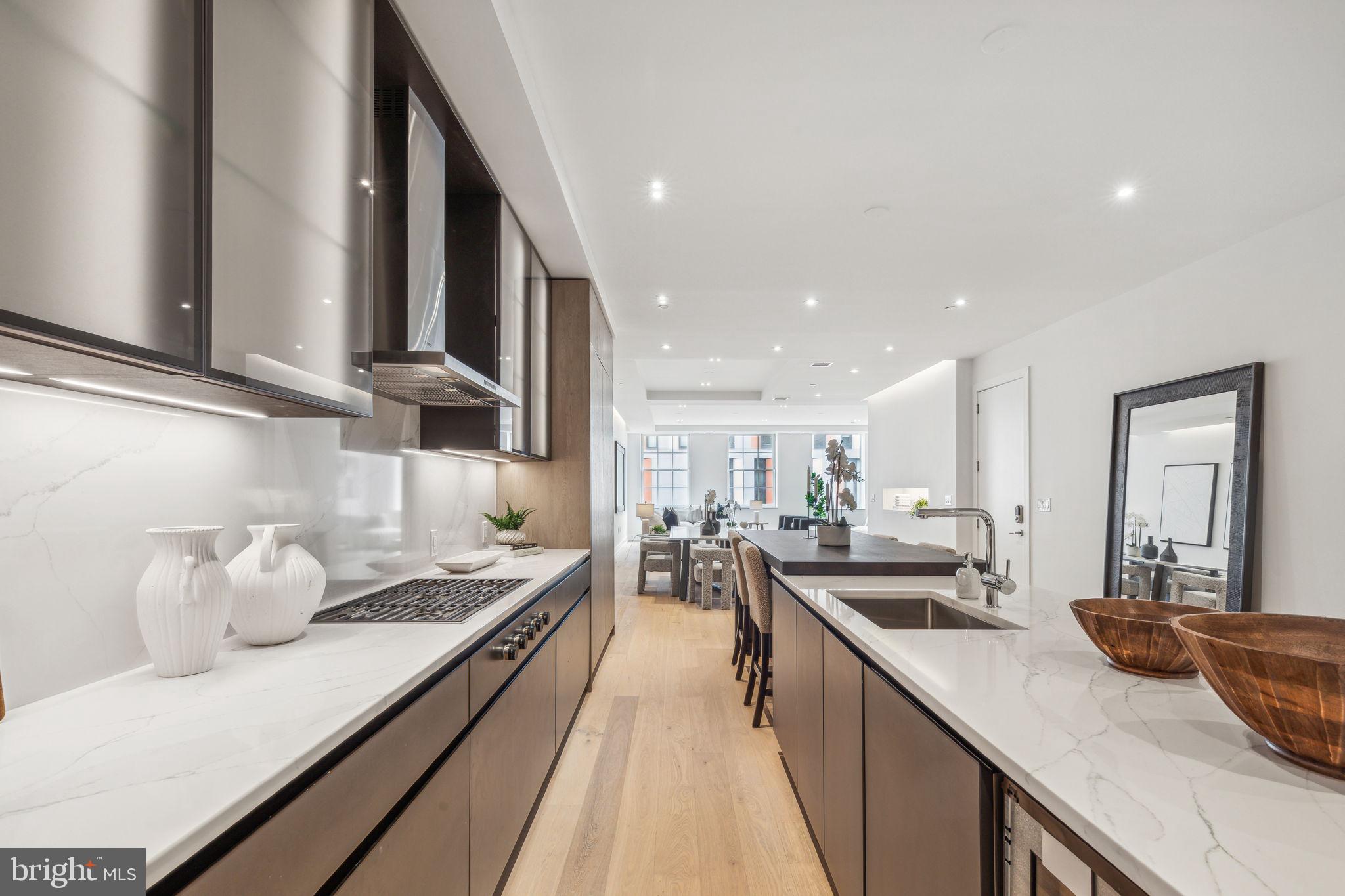 124 North 2nd Street, Unit 4 Philadelphia, PA 19106 - Photo 10 of 48 a kitchen with counter top space a sink and appliances